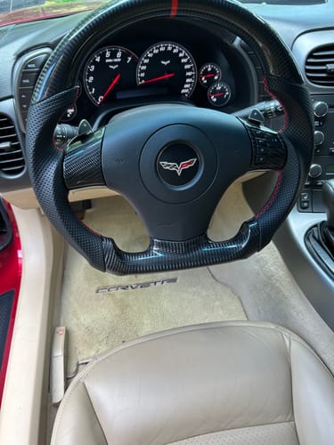 Customer photo review of Genuine Carbon Fiber Steering Wheel With Button Trim For C6 Corvette 2006-2011