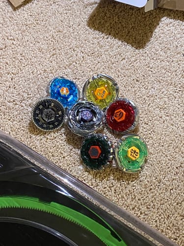 Customer photo review of Takara Tomy Beyblade Mystery Box (Metal Fusion / Fury / Masters) - 7 BEYBLADES + 2 ACCESSORIES!