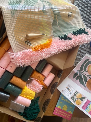 Customer photo review of A Bounty of Oranges Latch Hook Cushion Kit
