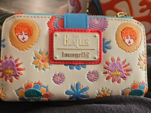 Customer photo review of Loungefly The Beatles All You Need Is Love Flap Wallet