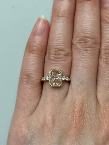 Customer photo review of DovEggs peacock blue side stones emerald moissanite engagement ring