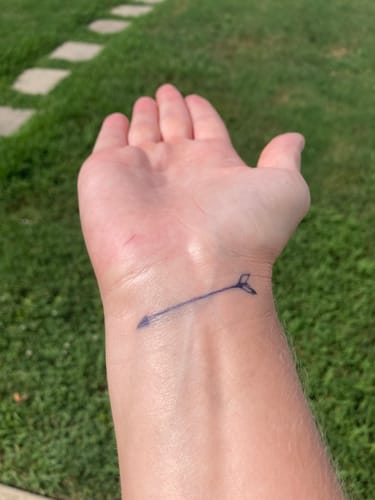 Customer photo review of Minimal Arrow Tattoo - Semi Permanent