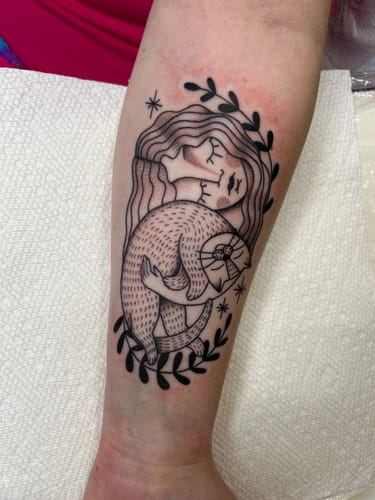 Customer photo review of Painless Tattoo Numbing Cream