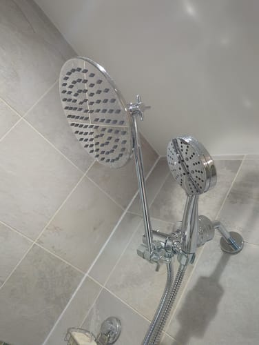 Customer photo review of 1-Handle Valve and Trim Shower System with 3-Spray Dual Shower Head and Adjustable Arm