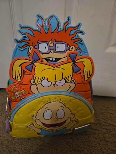 Customer photo review of Loungefly Nickelodeon Rugrats Tommy, Chuckie, and Angelica Triple Pocket Mini Backpack - 707 Street Exclusive