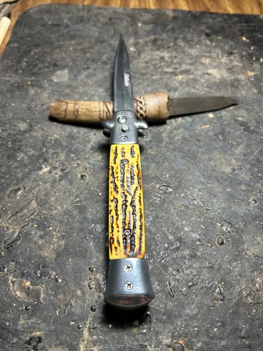 Customer photo review of Outlaw Stiletto Switchblade Knives