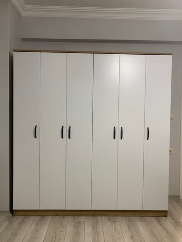 Customer photo review of Rani BA114 Geniş Gardırop Elbise Dolabı 6 Kapaklı 16 Raflı 2 Askılı Sepet Ceviz - Beyaz
