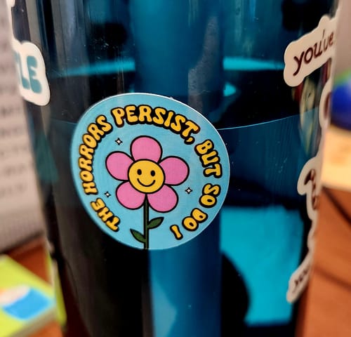 Customer photo review of The Horrors Persist, But So Do I Mini Sticker