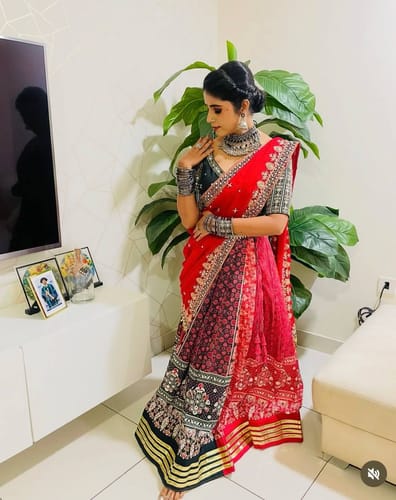 Customer photo review of Red Color Muslin With Real Mirror Work Designer Lehenga Choli