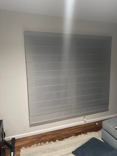 Customer photo review of SmartWings Motorized Light Filtering Roman Shades 60% Blackout Clio