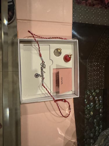Customer photo review of Silver Personalised Name Swastika Chakra Rakhi