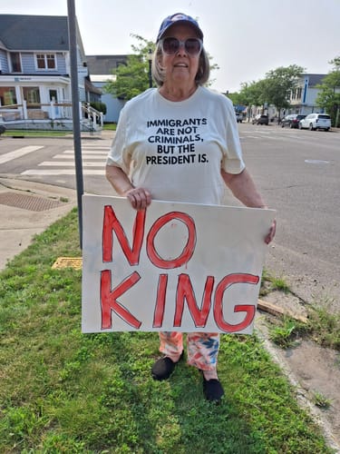 Customer photo review of Immigrants Premium Unisex T-Shirt