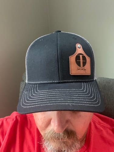 Customer photo review of Ear Tag Custom Leather Patch Trucker Hat - Richardson 112