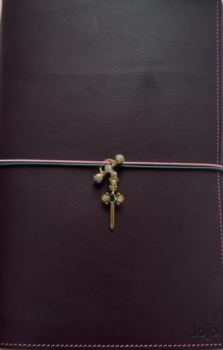 Customer photo review of Royal Sword Charm - Let Strength Be Seen