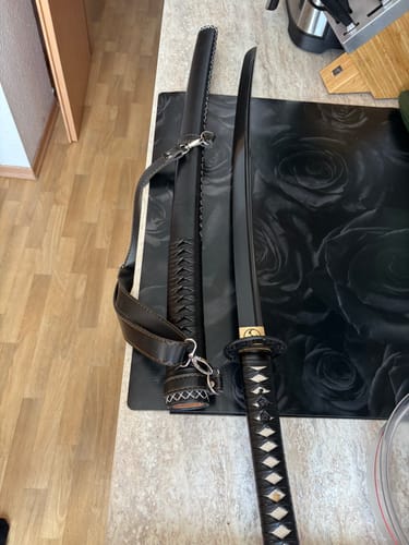 Customer photo review of black katanas