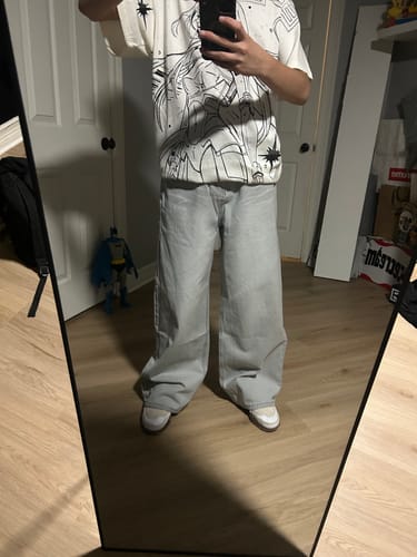 Customer photo review of INFLATION Washed Distressed Baggy Jeans