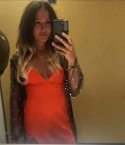 Customer photo review of Soiree Dress in Orange by Amanda Uprichard - RENTAL