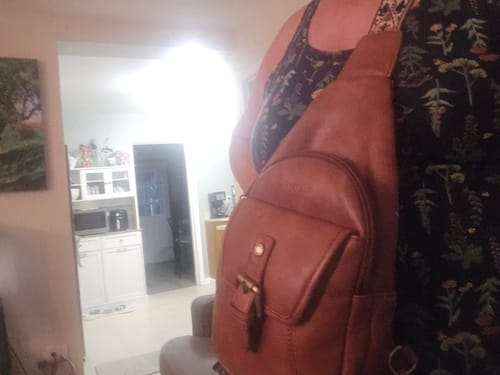 Customer photo review of Vintage Leather Sling Bag with Guitar Strap