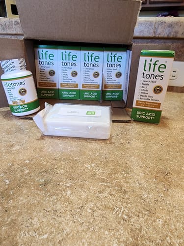 Customer photo review of Buy 6 Uric Acid Support Tinctures, Get a Free Uric Acid Support Capsules & Supplement Case!