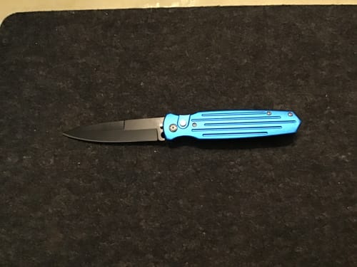 Customer photo review of Maddox Push Button Switchblades
