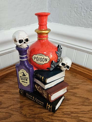 Customer photo review of Sorcerer’s Syrups Spooky Lighted Figurine, 8" Potions Poisons and Books Halloween Statue