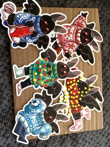 Customer photo review of Mothman Sweater Weather Stickers