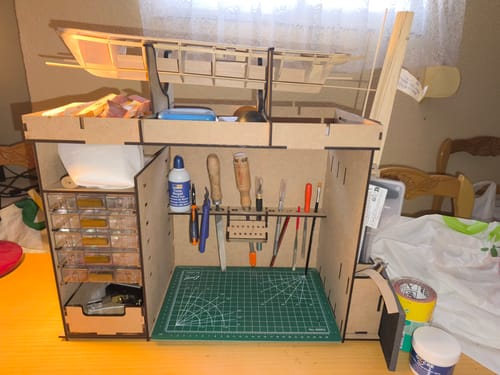 Reseña con foto de un cliente sobre Mueble taller organizador