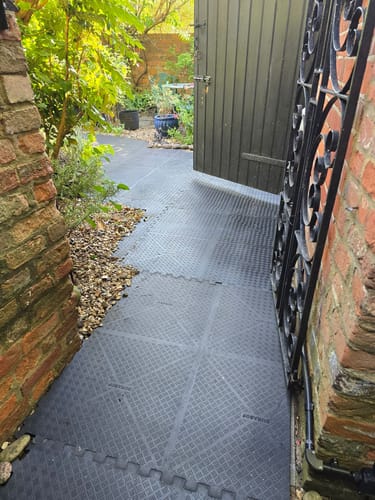Customer photo review of Durasof Heavy Duty Rubber Gym Tiles - Durable, Slip-Resistant, High Impact Resilience