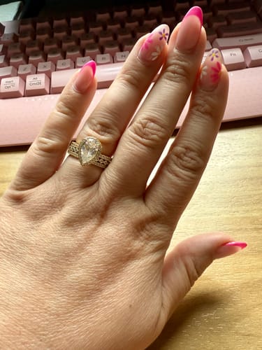 Customer photo review of Louily 3PC Classic Halo Pear Cut Wedding Ring Set With Eternity Wedding Bands