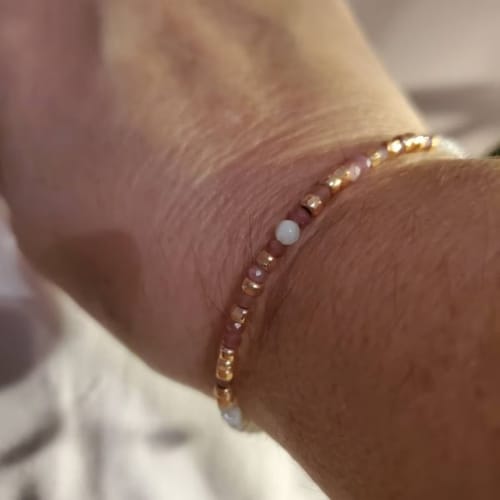 Customer photo review of Pink Tourmaline 'Strong As Fuck' Morse Code Bracelet