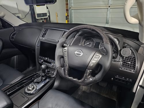 Customer photo review of Classic Carbon Black Leather/Perforated Sides Steering Wheel Core to suit Nissan Y62 Patrol (2018-2025)