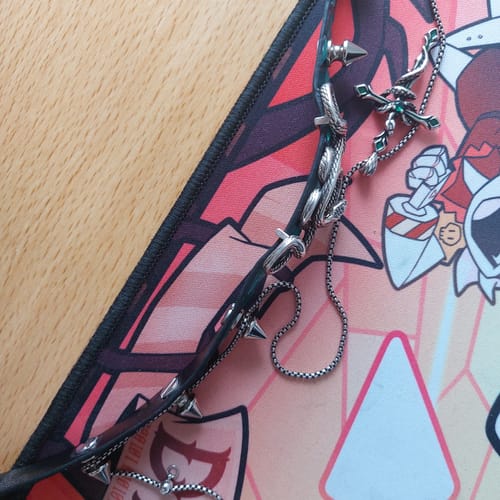 Customer photo review of "Snake Bite" Platinum Plated Layered Leather Rivet Pendant Choker Necklace