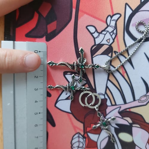 Customer photo review of "Snake Bite" Platinum Plated Statement Snake Dangle Earrings