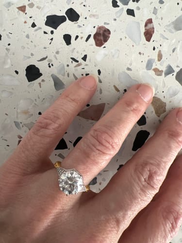 Customer photo review of Vintage Moissanite Side Stone Accents Milgrain Two Tone Engagement Ring