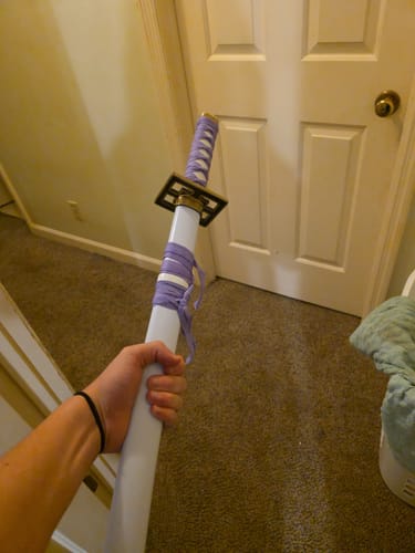 Customer photo review of Senbonzakura Katana Sword of Kuchiki Byakuya in $77 (Japanese Steel Available) Zanpakuto from Bleach-Purple & White | Bleach Katana | Zanpakuto Katana