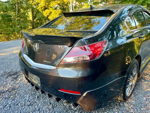 Customer photo review of 2009-2014 acura TL carbon fiber trunk spoiler.