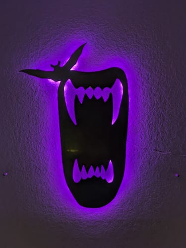 Customer photo review of Vampire Teeth - Metal Wall Art