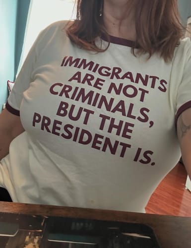 Customer photo review of Immigrants Premium Unisex T-Shirt