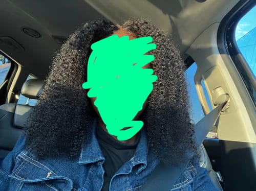 Customer photo review of CurlyMe Pre-bleached Wear Go Glueless Afro Kinky Curly Pre-cut HD Lace Wig Pre-plucked