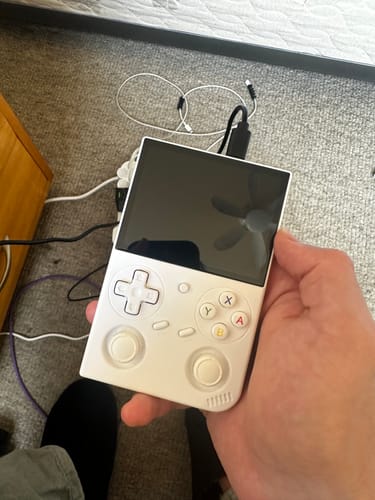 Reseña con foto de un cliente sobre ANBERNIC RG35XX PRO