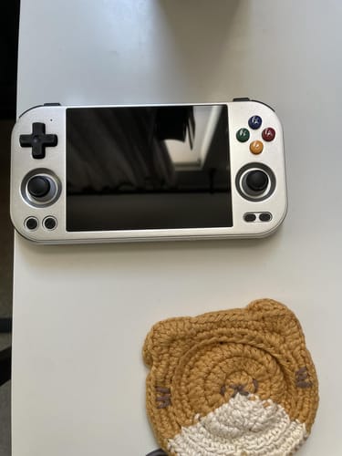Reseña con foto de un cliente sobre ANBERNIC RG477M