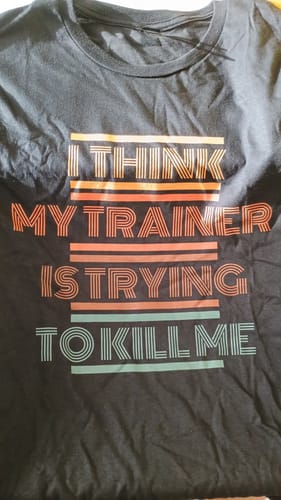 Customer photo review of I THINK MY TRAINER T-SHIRT