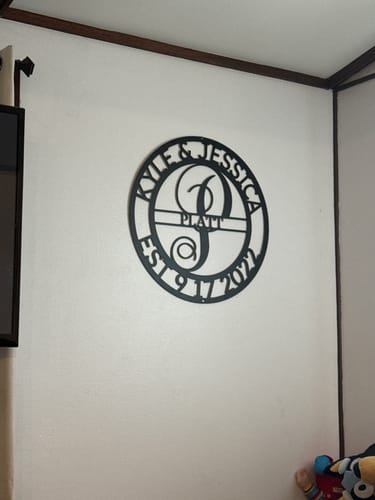 Customer photo review of Elaborate Name - Steel Sign