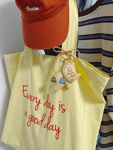 Customer photo review of Paw-Stuck Kitty Bag Charm