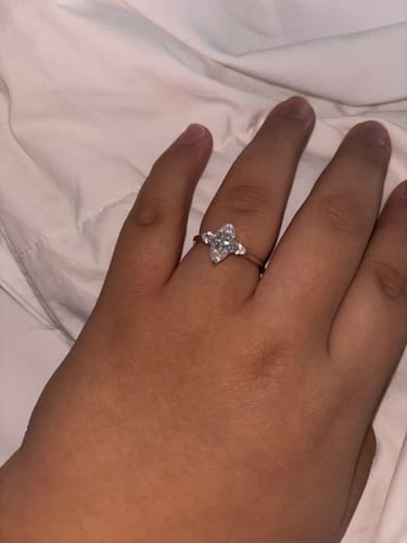 Sebastian H. review of Three Stone Marquise-Cut Moissanite Pear-Cut Side Stone Engagement Ring image 1 out of 1