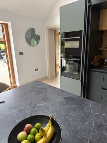 Customer photo review of Puffy Khaki - Glass Wall Clock