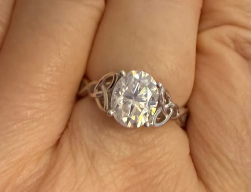 Customer photo review of Entwined Celtic Love Knot Solitaire Moissanite Engagement Ring