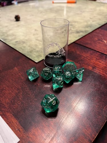 Customer photo review of Bermuda Triangle Resin Dice Set