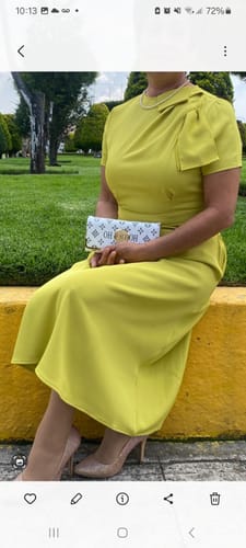 María Elena S. review of Loose Short Sleeves Pleated Solid Color Split-Joint Round-Neck Evening Dresses Midi Dresses image 1 out of 1