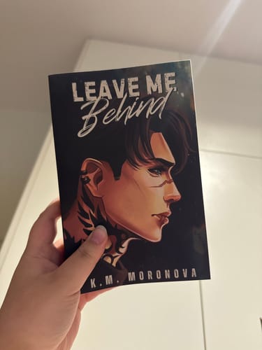 Customer photo review of Leave Me Behind by K.M. Moronova - SE paperback